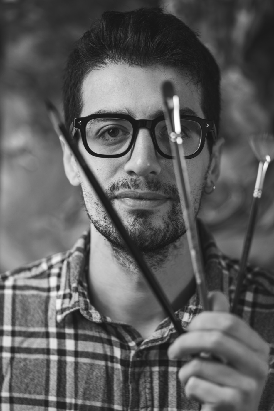 Ritratto in bianco e nero di Emanuele Cerro, tattoo artist